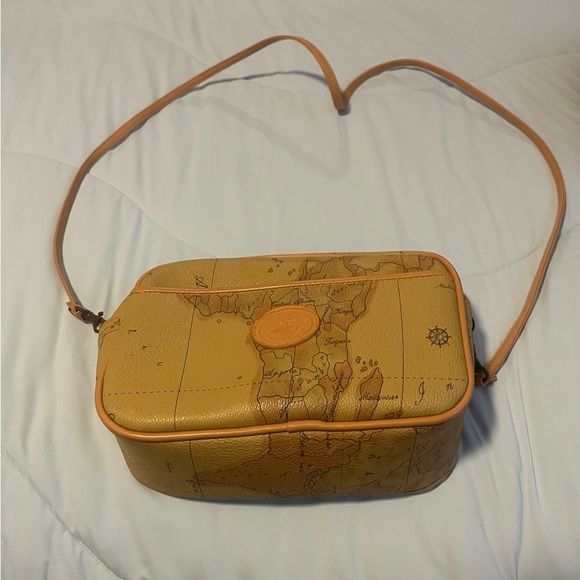 Allan & Edward Handbags - Allan Edward world map purse with zip